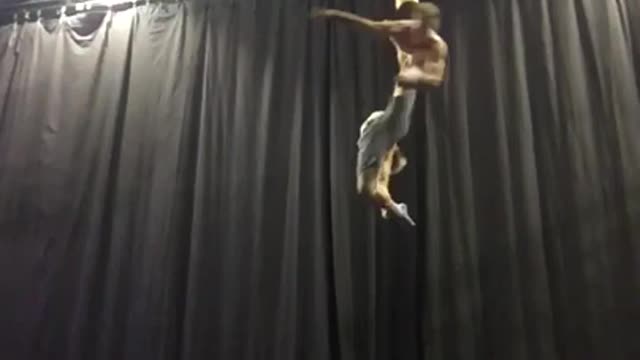 Guys Display Amazing Performance While Hanging From Ceiling In Aerial Straps
