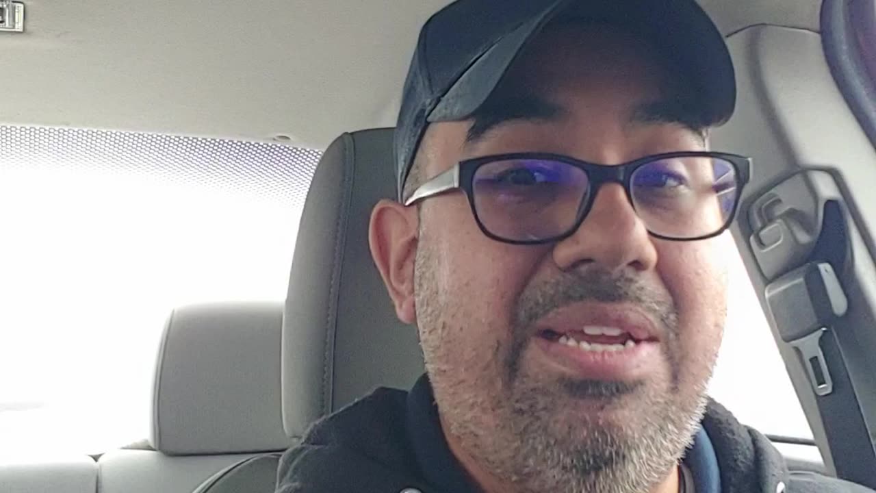 Illegal Alien on top of a Funeral Car.