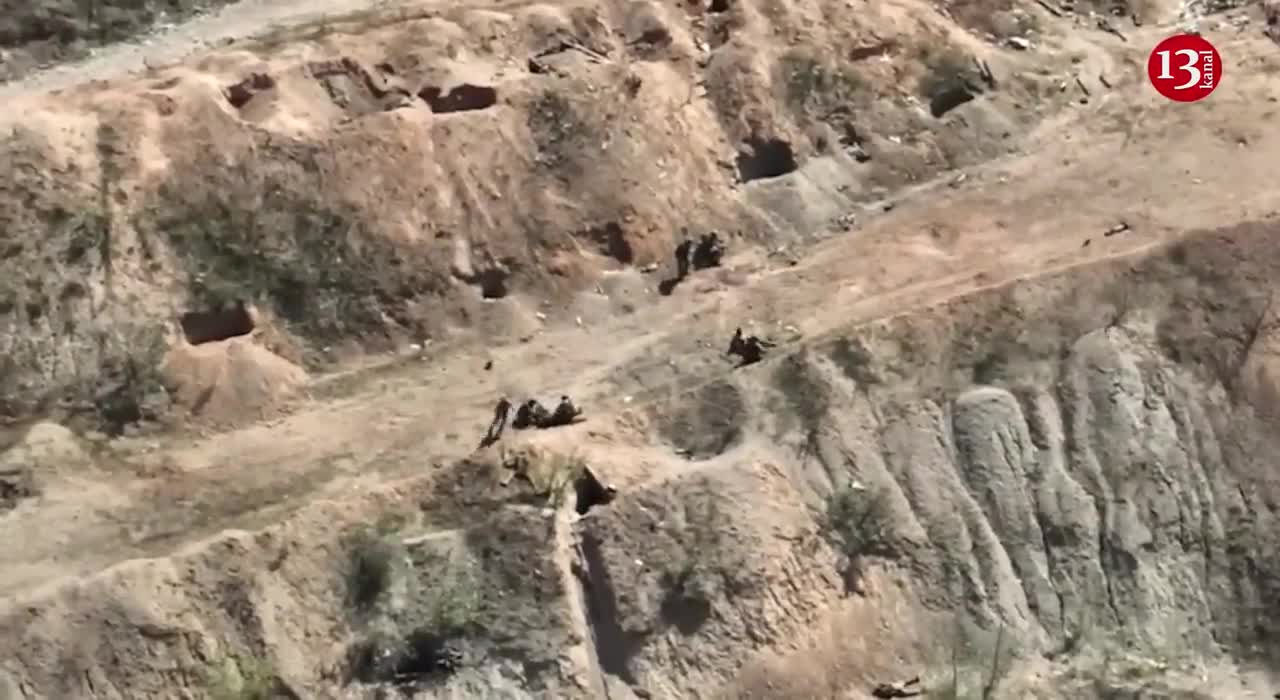 Russians try to rescue surrounded wounded comrades