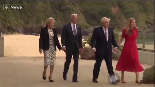 Biden"Caught"Teasing Boris Wife on His UK Tour