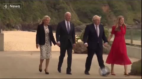 Biden"Caught"Teasing Boris Wife on His UK Tour