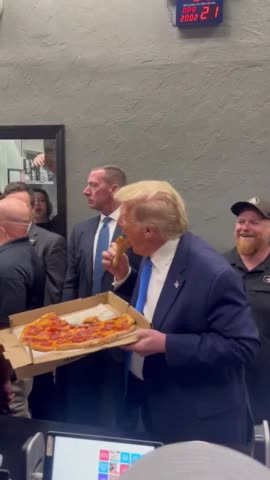 Donald Trump Gives His Supporters Pizza In AWESOME New Clip