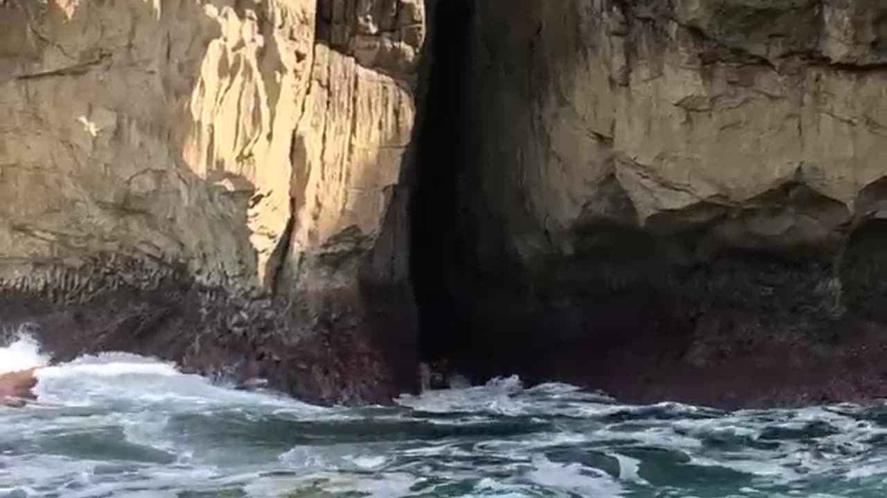 Paddleboarder Risks Rocky Crevice