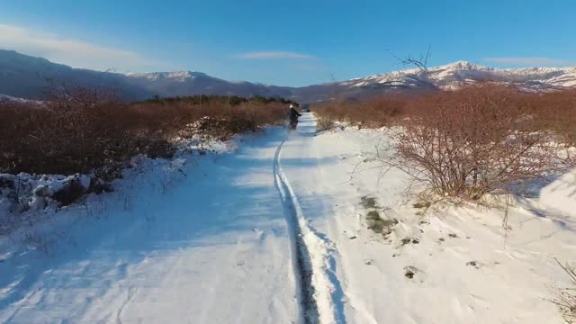 Driving Motorbikes in The Snow