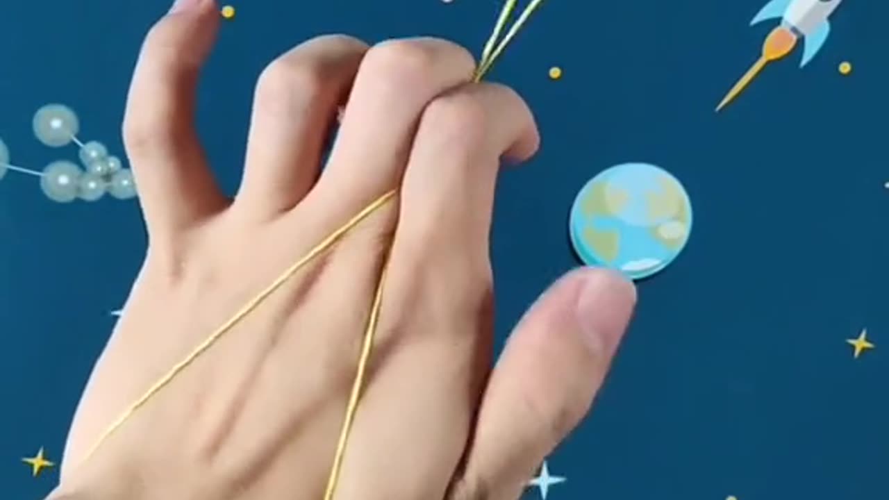 Easy rubber band magic trick