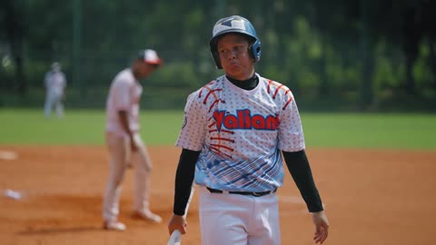 Medium Shot of Softball Player Missing the Ball