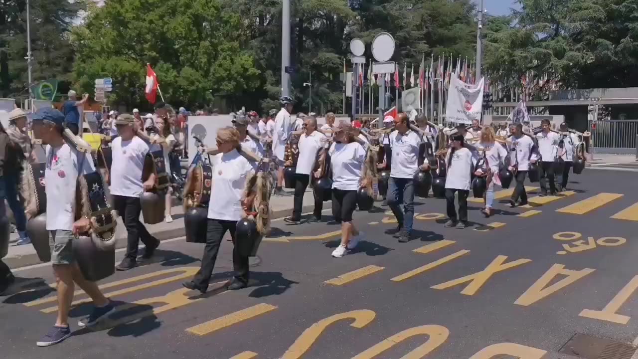 The Swiss freedom clock ringers have arrived outside the WHO to protest the pandemic treaty.