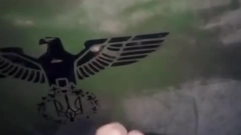 Ukrainian tank decorated with a III Reich Nazi eagle