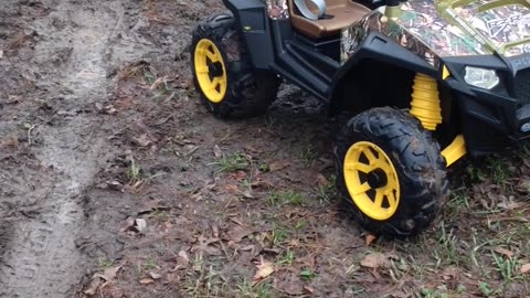 Brother Tows His Sister Out Of The Mud