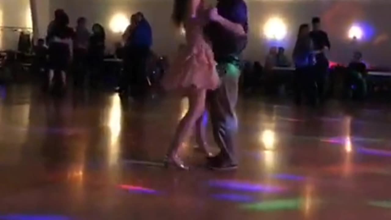 Cute Young Couple Slow Dancing