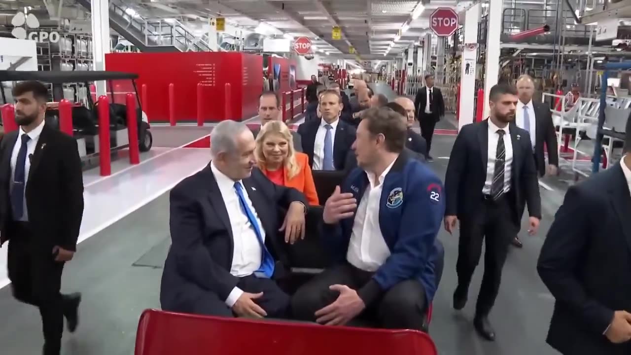 Elon musk giving a tour of the Tesla Factory to the Prime Minister of Israel, Netanyahu