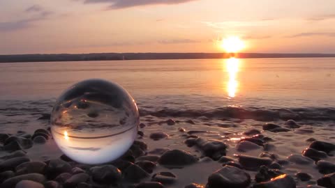 Glass Ball By The Shore