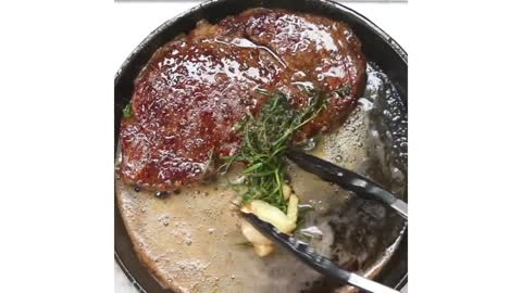 RIB EYE STEAK WITH GARLIC BUTTER