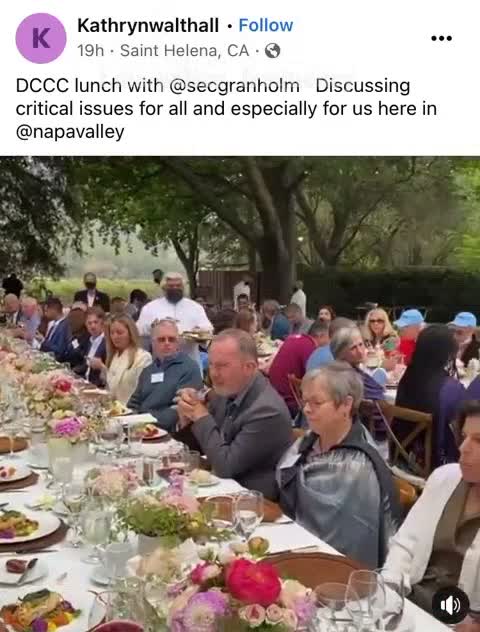 Democrats enjoying a meal, side by side, with Nancy Pelosi speaking
