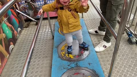Toddler Has Trouble in Funhouse