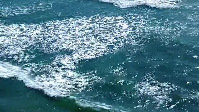 Beach, waves, listening to the sound of the sea