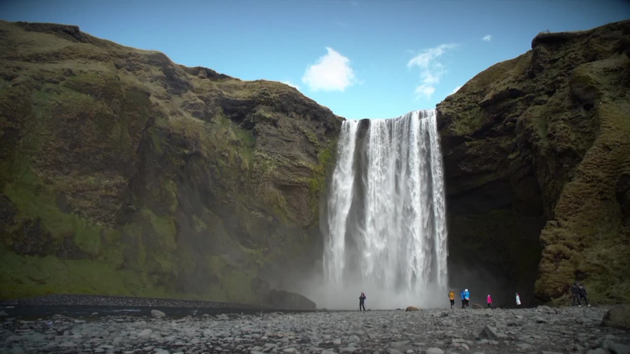 People at the Base of the Big Waterfall _"