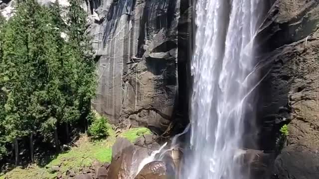 Rainbow and waterfall