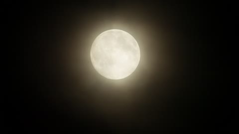 Full moon with a soft haze