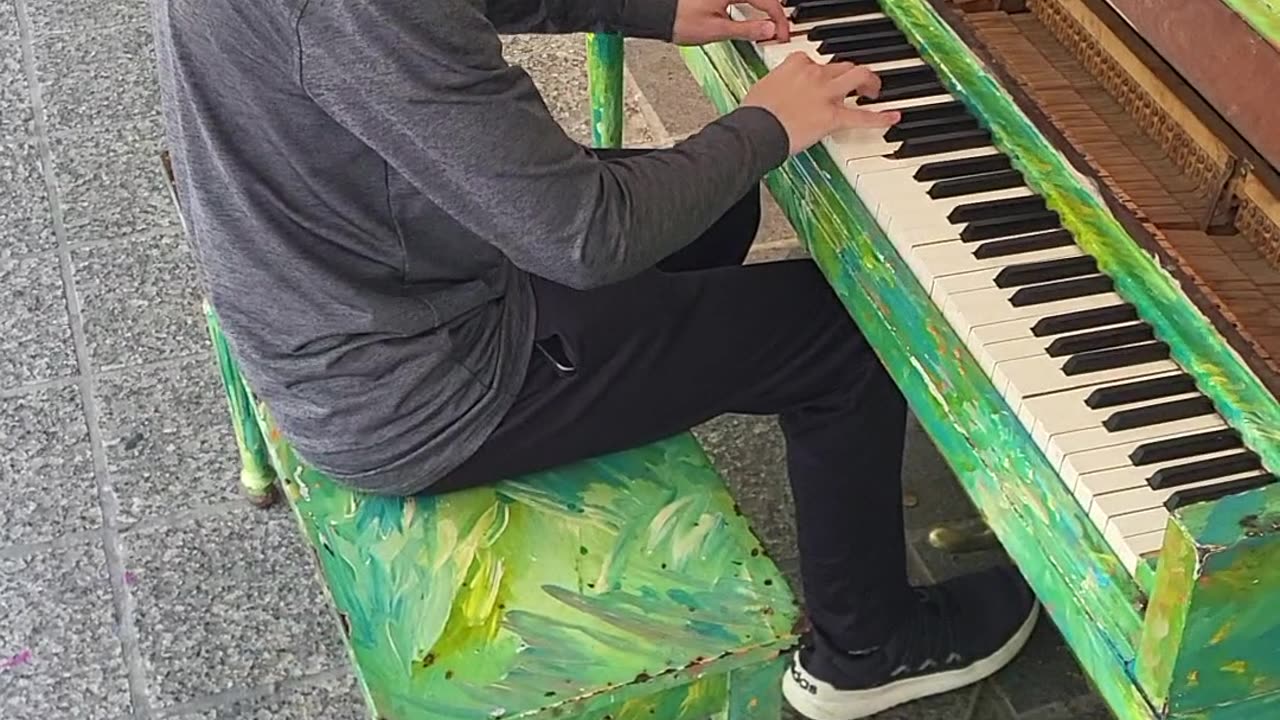 Jack plays Street Piano outside ASO