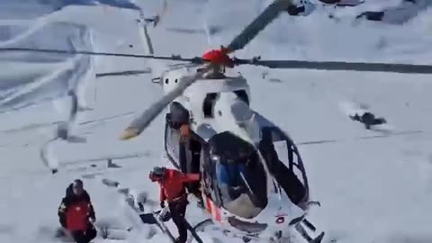Rescue helicopter helping people at glashier