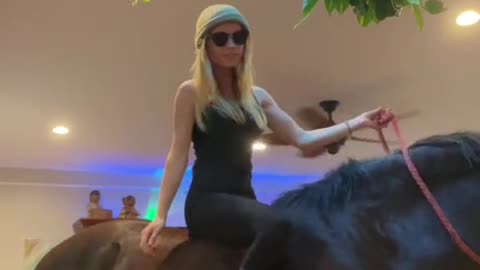 Ride a horse in the room