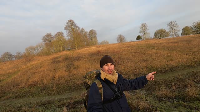 Walking and vlogging while hiking at an iron age fort