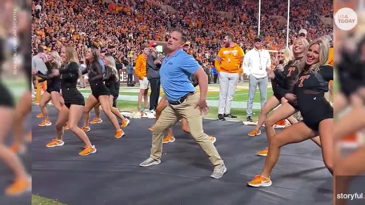 Busted! Fake security guard dances during Tennessee football game | USA TODAY