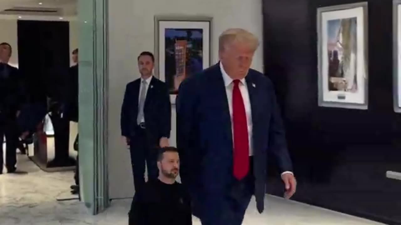 Big Man Trump walking with Tiny Man Zelensky