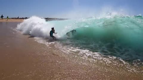 Surfing and Skimboarding WEDGE on massive HIGH TIDE