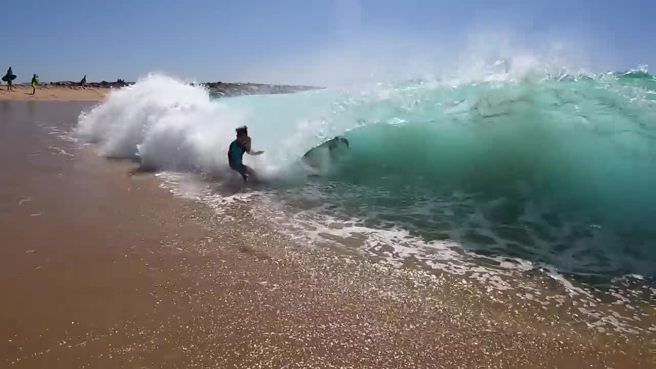 Surfing and Skimboarding WEDGE on massive HIGH TIDE