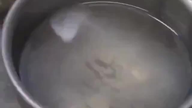 Spoon of liquid nitrogen in a bowl of gasoline