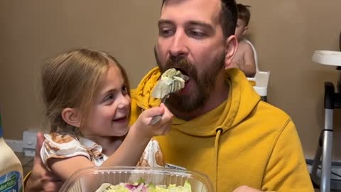 Daughter Feeds Dad Aggressively