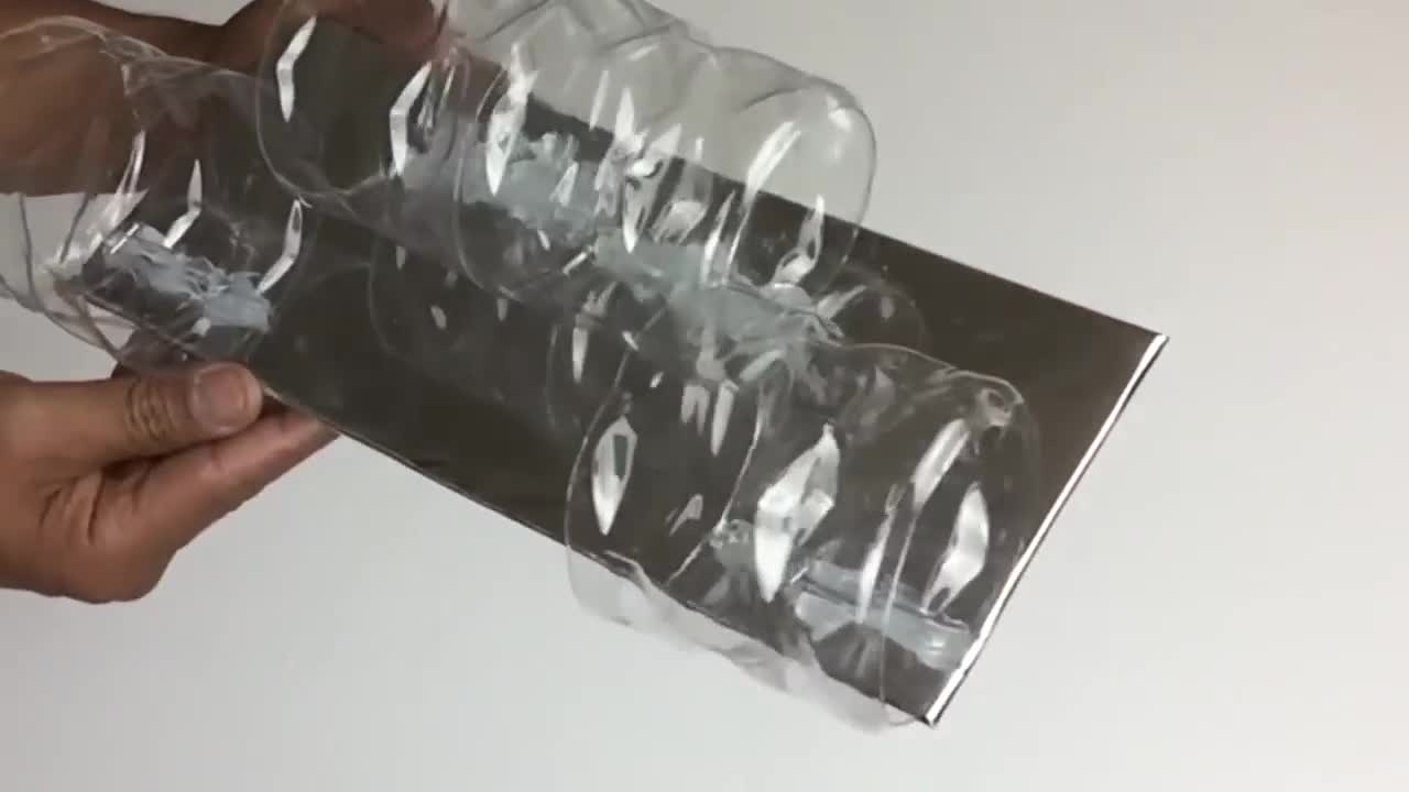 DIY Home Decoration-stick the remaining 2 pieces of plastic to the foam board