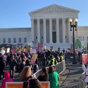 Pro-life and pro-choice protestor groups outside the Supreme Court