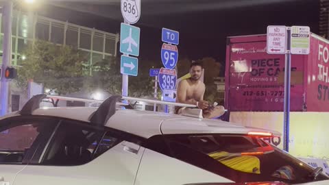 Miami Man Gets Comfy Atop Cop Car