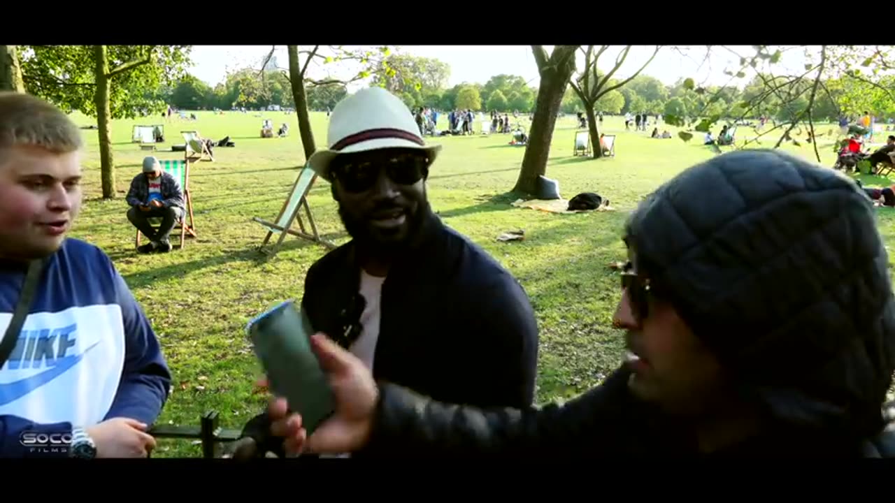 Muslims explaining changes within Arabic Qurans Paperboy Speakers Corner