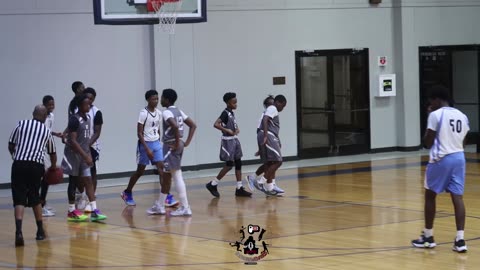 Maalik Williamson with the and 1 layup