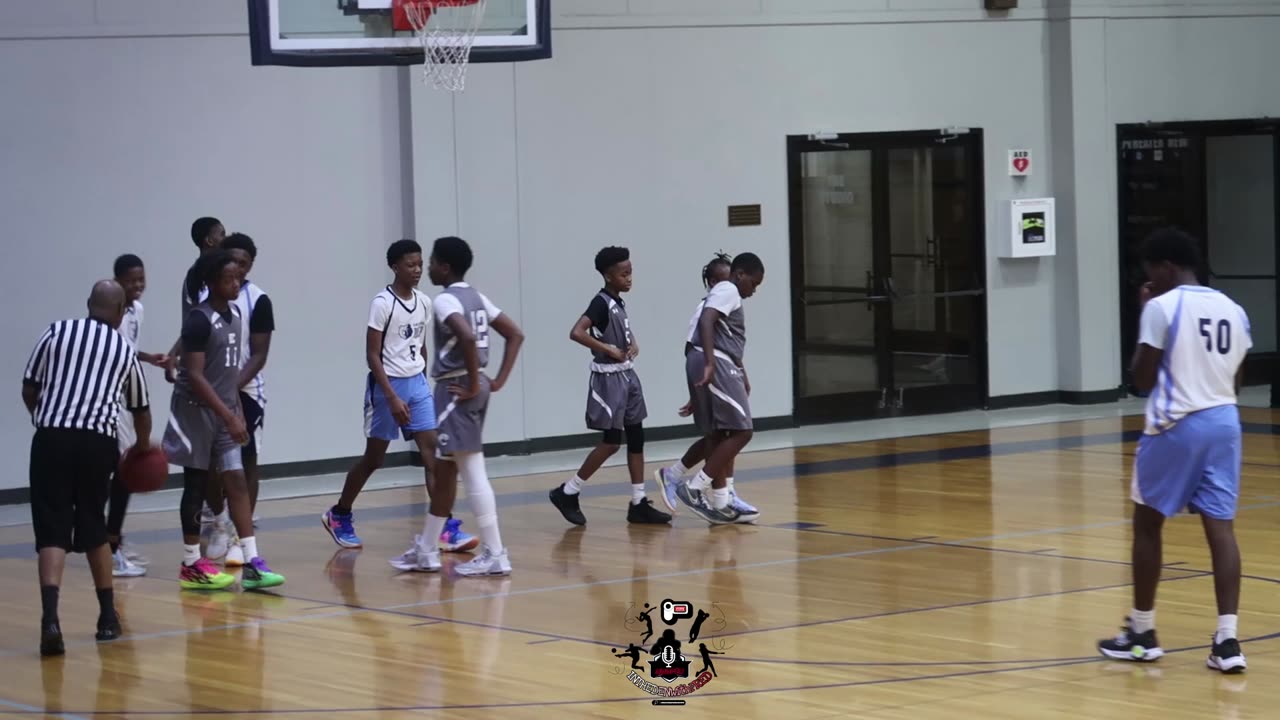 Maalik Williamson with the and 1 layup