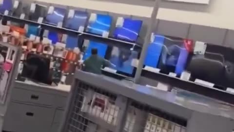 Man damages 19 TVs in Walmart. The worlds going nuts