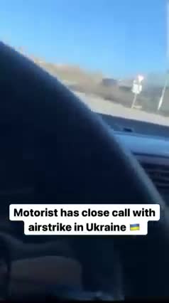Motorist has close call with airstrike in Ukraine