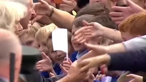 Schoolboy overcome with joy after shaking hands with King Charles and Queen Consort Camilla