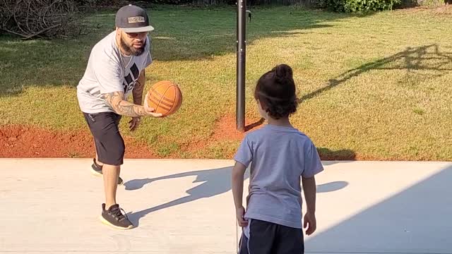 Dad gives inspiration to his boy.