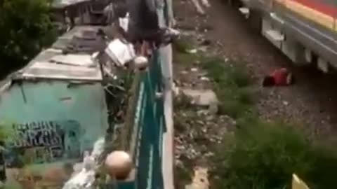 guy gets hit by a train