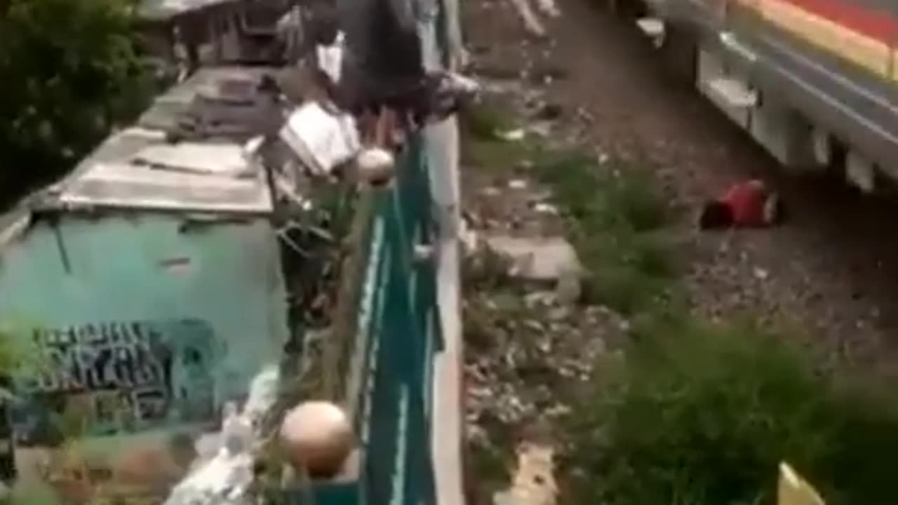 guy gets hit by a train
