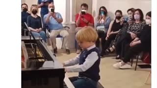 5 year old playing Mozart.