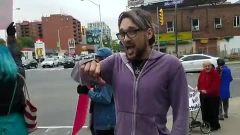 Goon Kicks Pro-Life Protester Because He Doesn't Like Her Answer To His Question