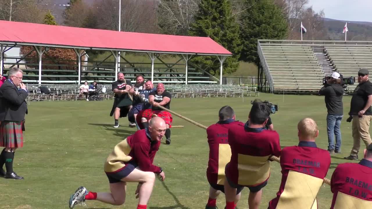 World's Strongest Men in a Tug o' War Challenge at Braemar Gathering Highland Games site in Scotland