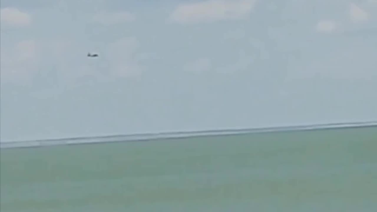 Eyewitnesses filmed the SU-25 crashing into the Sea of Azov.