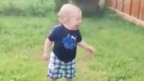 babies playing with water and animals